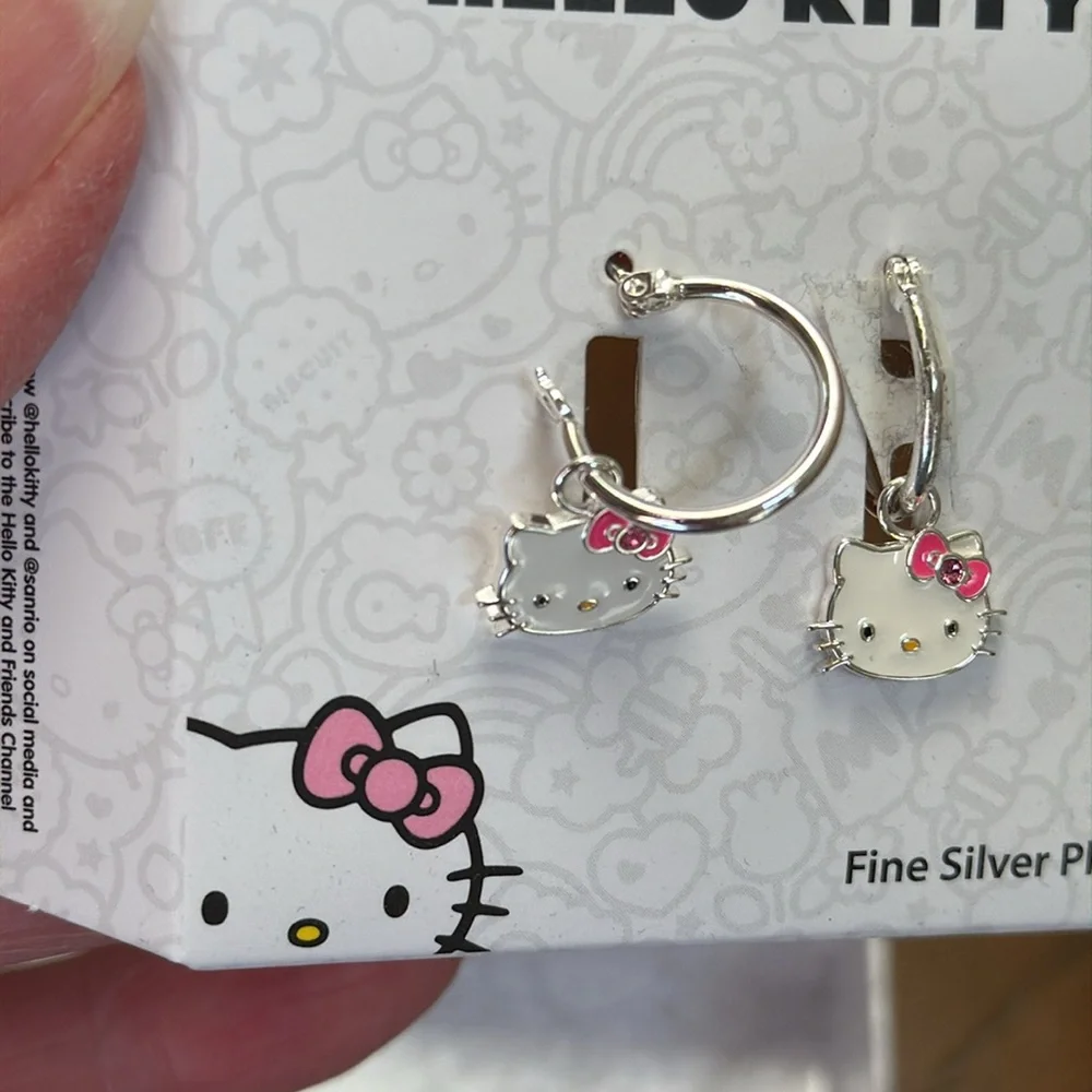New Hello Kitty Silver Plated Hoop Earrings with White & Pink enamel charm.